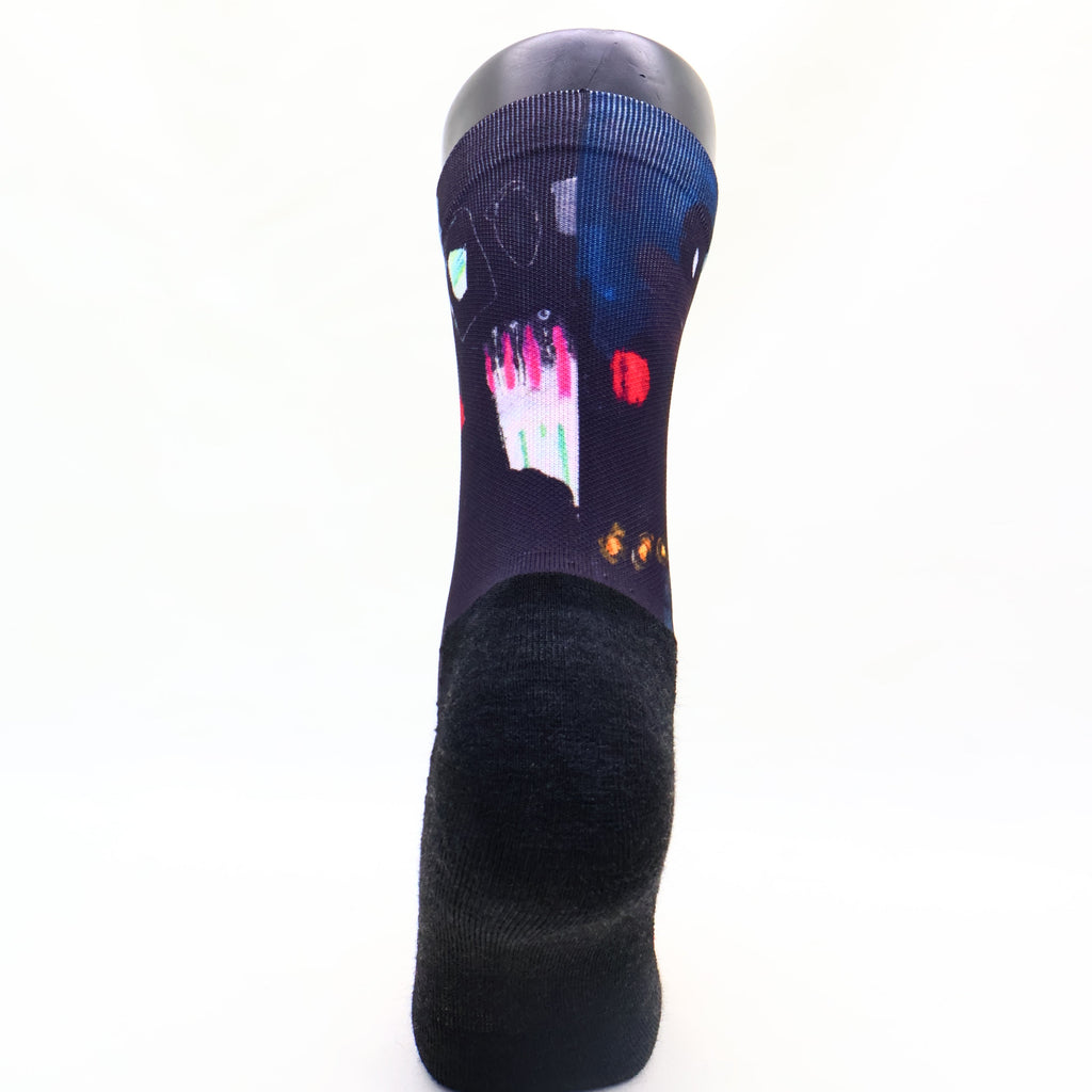 Black trail sock with colorful abstract design