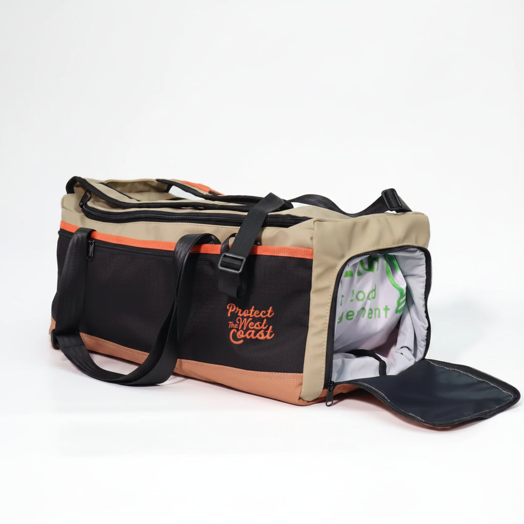 A beige and black duffel bag with orange accents, shown with its front panel open to reveal a gray interior. The bag features the text 'Protect West Coast' in orange on the side.