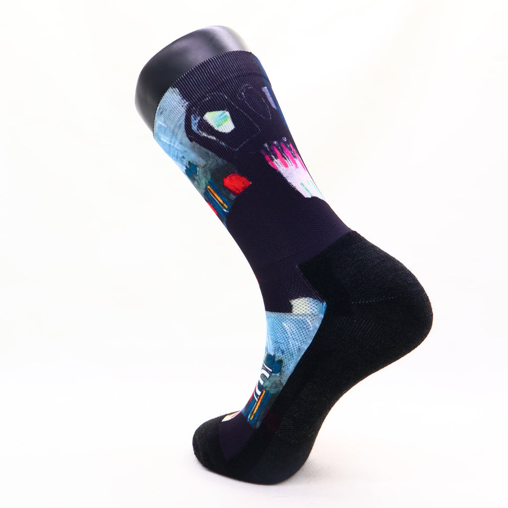 Black sock with colorful abstract design 