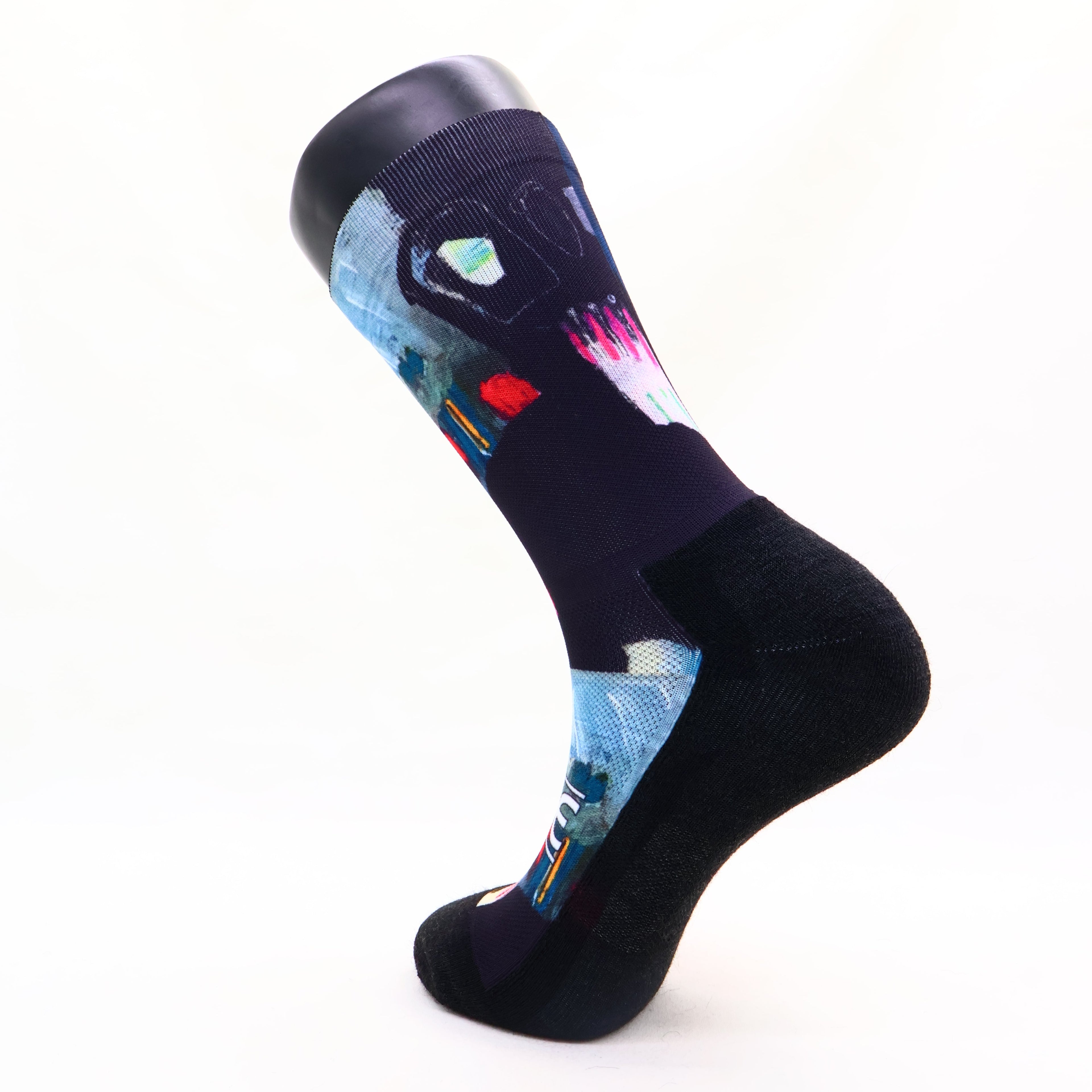 Black sock with colorful abstract design 
